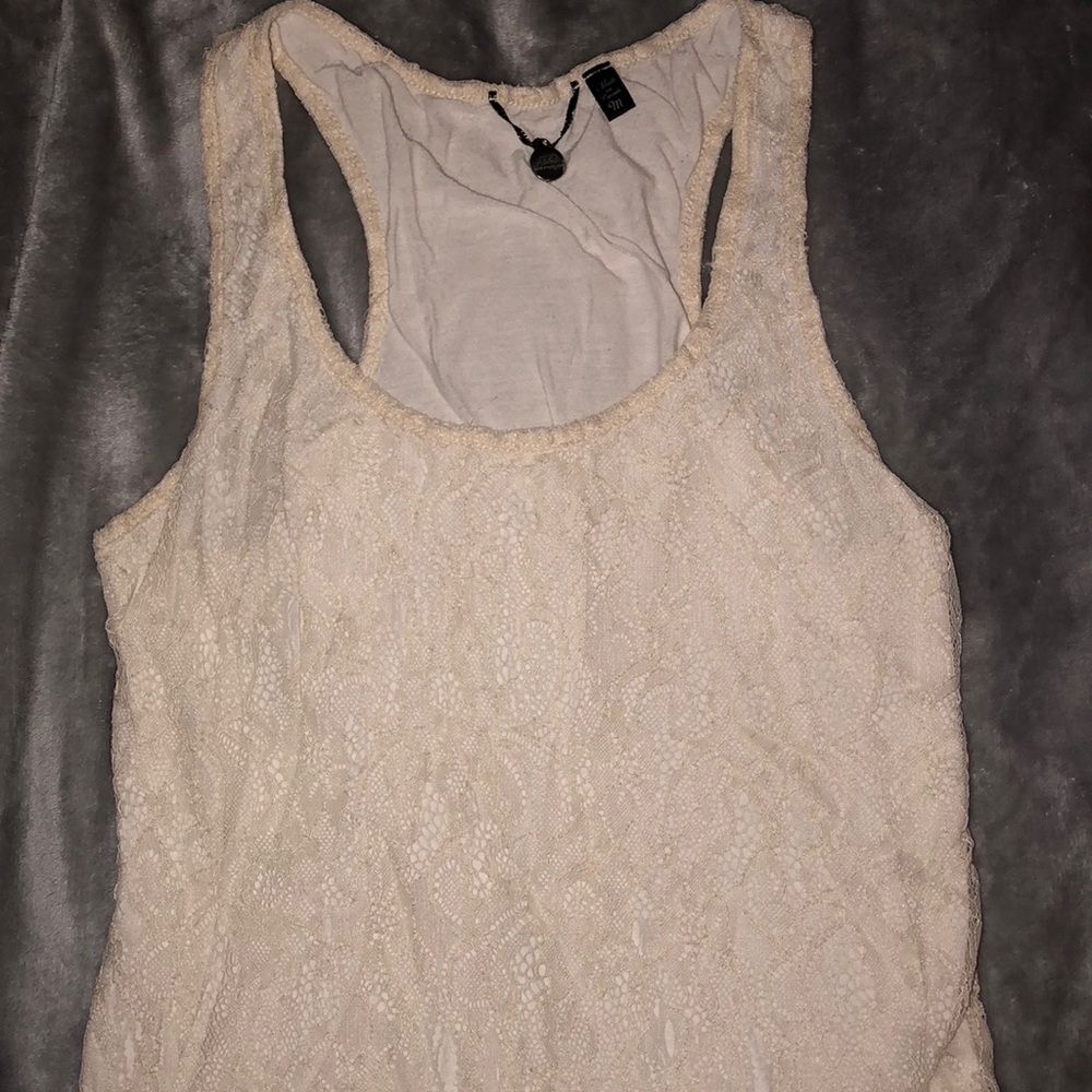 Cream colored, lace, tank top.